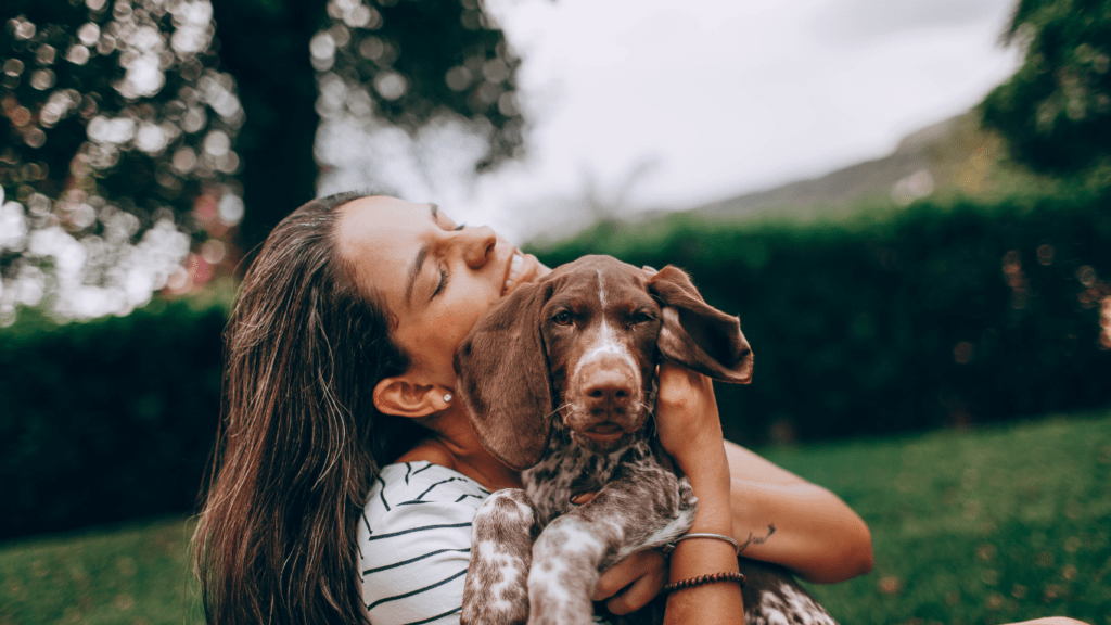 woman taking care her dog