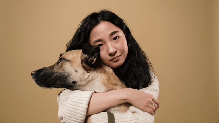 woman giving comfort to her dog